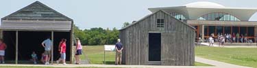 park visitors at the Wright brothers living quaters and visitor center